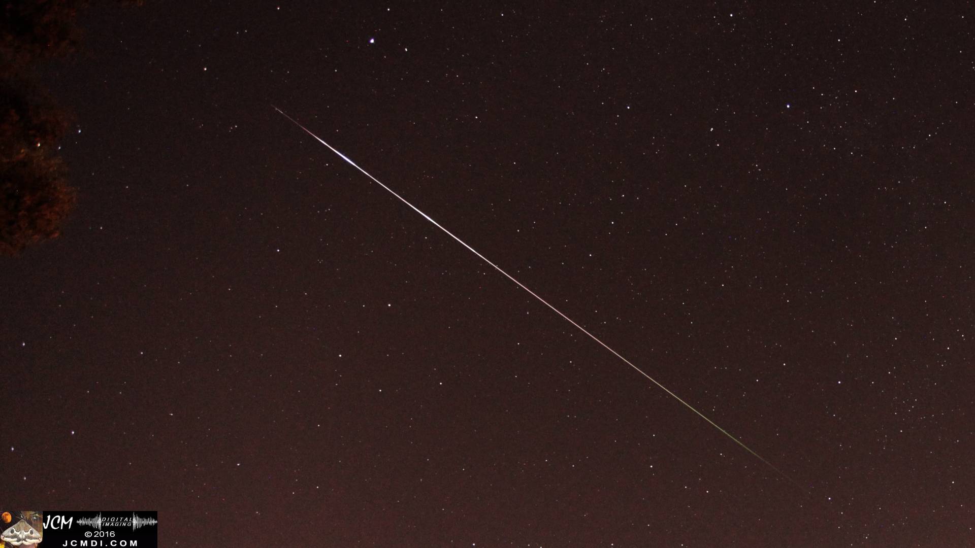 A large Perseid Meteor streaks across the sky on 8-11-2016. JCMDI.COM